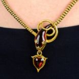 A Victorian gold snake necklace with foil back garnet crest and heart locket drop and rose-cut