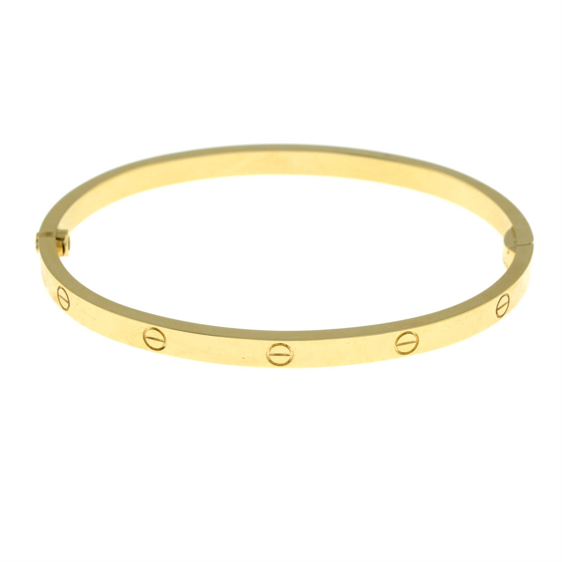 An 18ct gold 'Love' bangle, by Cartier. - Image 5 of 5