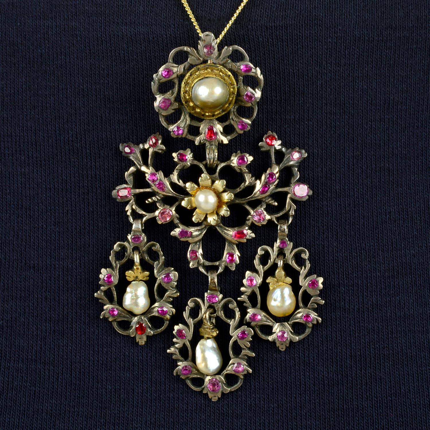 A late 18th century silver and gold pearl, foil back ruby girandole pendant.