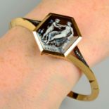 A French late 19th century 18ct gold rose-cut diamond and enamel hinged bangle, depicting Eros and