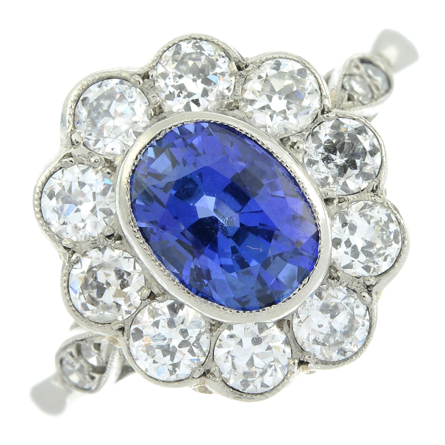 A platinum sapphire and old-cut diamond floral cluster ring. - Image 2 of 6