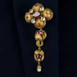 A Victorian 18ct gold foil back garnet, aquamarine and chrysoberyl foliate brooch with pendant drop.