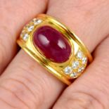 A ruby cabochon and brilliant-cut diamond tapered band ring.