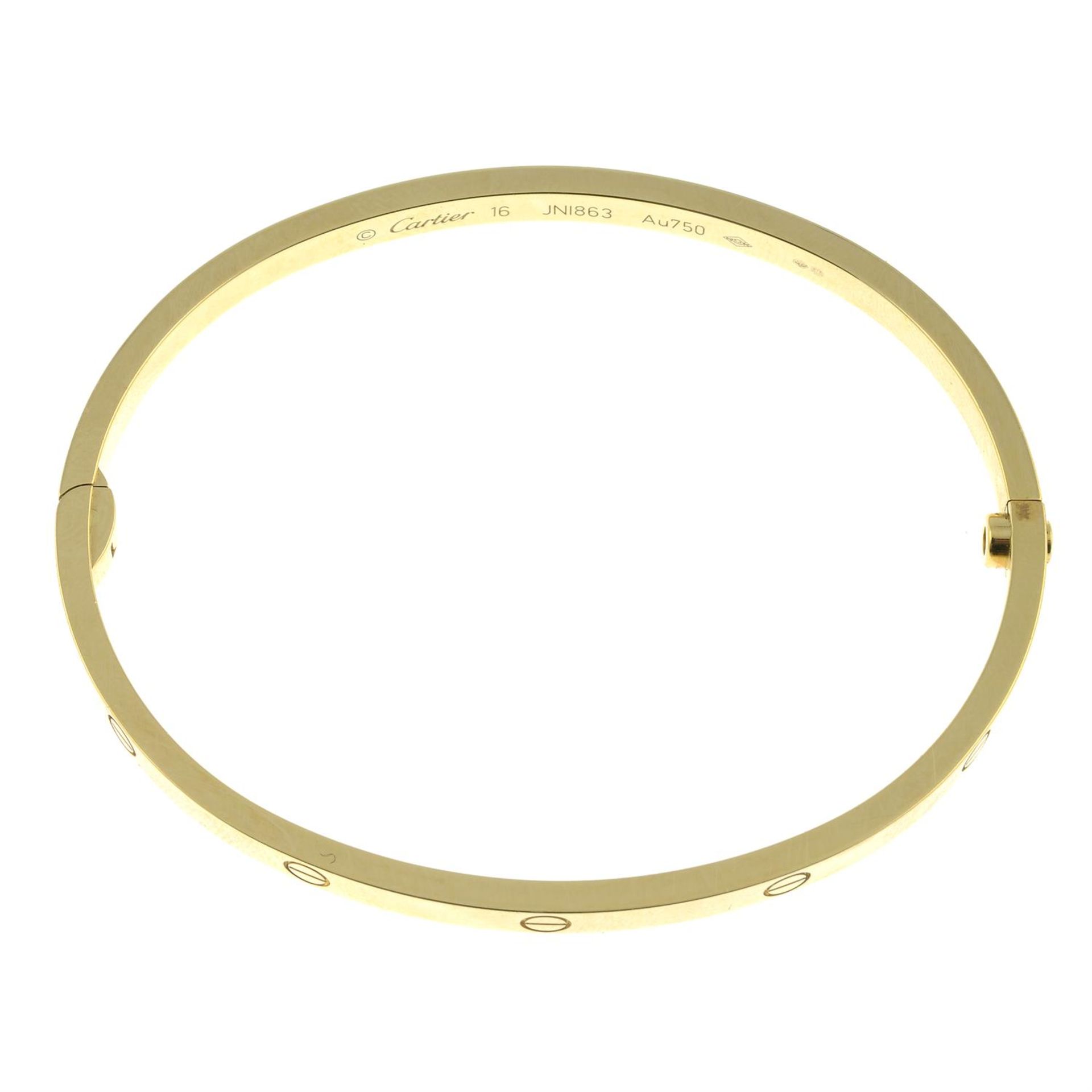 An 18ct gold 'Love' bangle, by Cartier. - Image 4 of 5