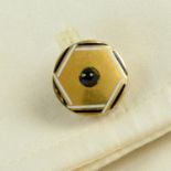 A pair of early 20th century sapphire, black and white enamel cufflinks.