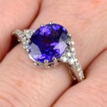 An 18ct gold tanzanite and brilliant-cut diamond ring.