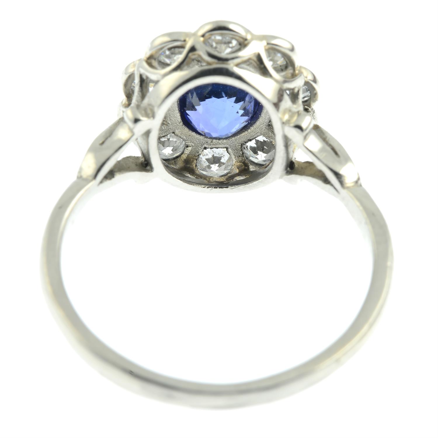 A platinum sapphire and old-cut diamond floral cluster ring. - Image 4 of 6