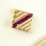 A pair of Art Deco 14ct gold ruby cufflinks, by Paul Flato.
