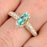 An 18ct gold Paraiba tourmaline and diamond ring, by Kat Florence.