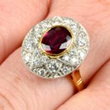 An 18ct gold ruby and diamond floral ring.
