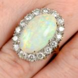 A mid 20th century gold opal and brilliant-cut diamond ring.