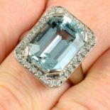 An aquamarine and brilliant-cut diamond cluster dress ring.