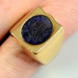 A sapphire intaglio ring, carved with an armorial.