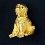 A puppy brooch, with sapphire eyes and brilliant-cut diamond hinged dog tag, by Tiffany & Co.