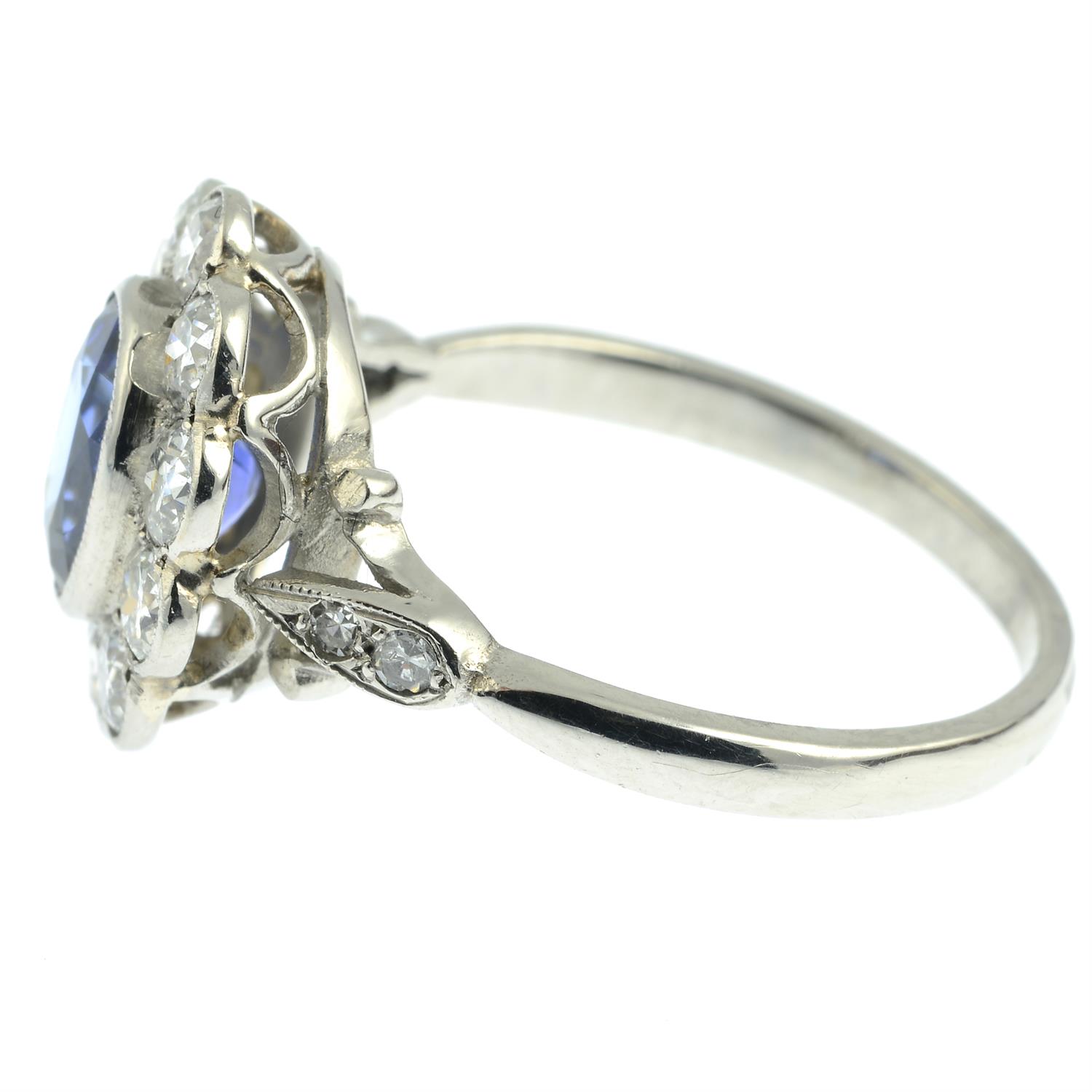 A platinum sapphire and old-cut diamond floral cluster ring. - Image 3 of 6