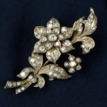 A late 19th century silver and gold circular-cut diamond floral brooch, set 'en tremblant'.