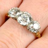A late Victorian 18ct gold graduated old-cut diamond three-stone ring.