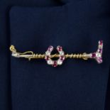 An early 20th century silver and gold ruby and old-cut diamond bar brooch modelled as a riding crop