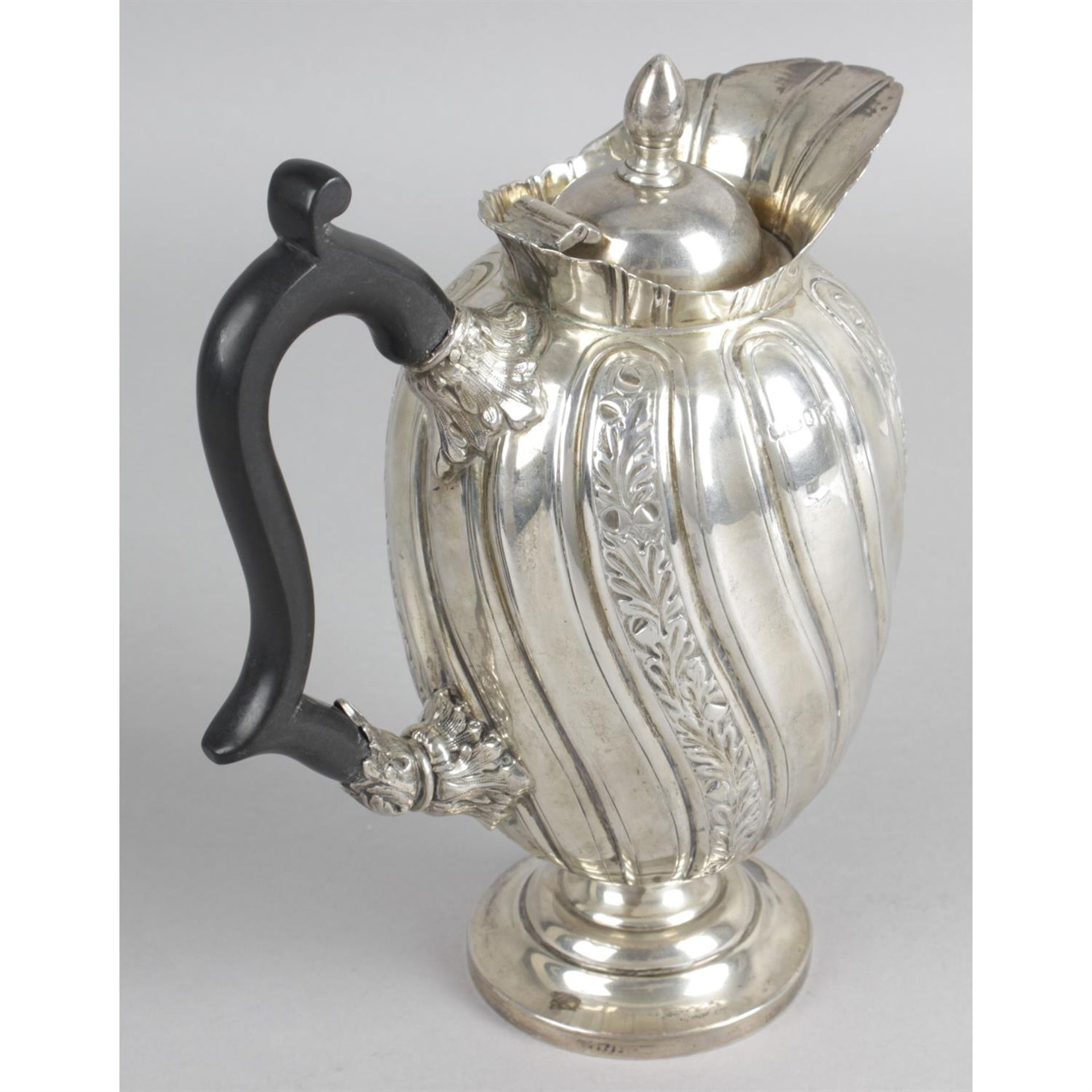 A late Victorian silver lidded jug or ewer, by Walker & Hall. - Image 2 of 3