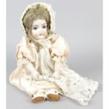 A modern reproduction J.D Kestner C19 Creations Past Ltd. bisque headed doll.