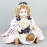 A modern reproduction BRU C19 Creations Past Ltd. bisque headed collectors doll.
