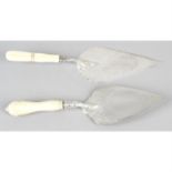 A late Victorian silver presentation trowel with ivory handle, together with an Edwardian example.