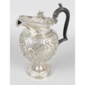 A George IV silver jug.