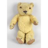 A Chad Valley Hygienic Toys gold plush jointed teddy bear.