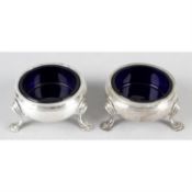 A pair of George II silver cauldron open salts.