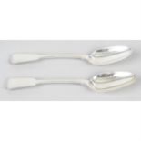 A pair of George IV silver Fiddle pattern table spoons.