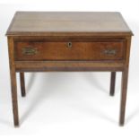 A 19th century oak and mahogany cross-banded side table.