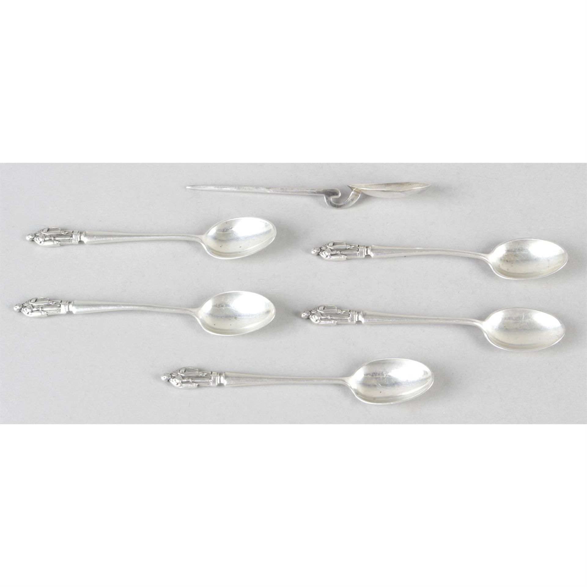 A selection of assorted spoons to include a reproduction Trefid spoon and Roman spoon,