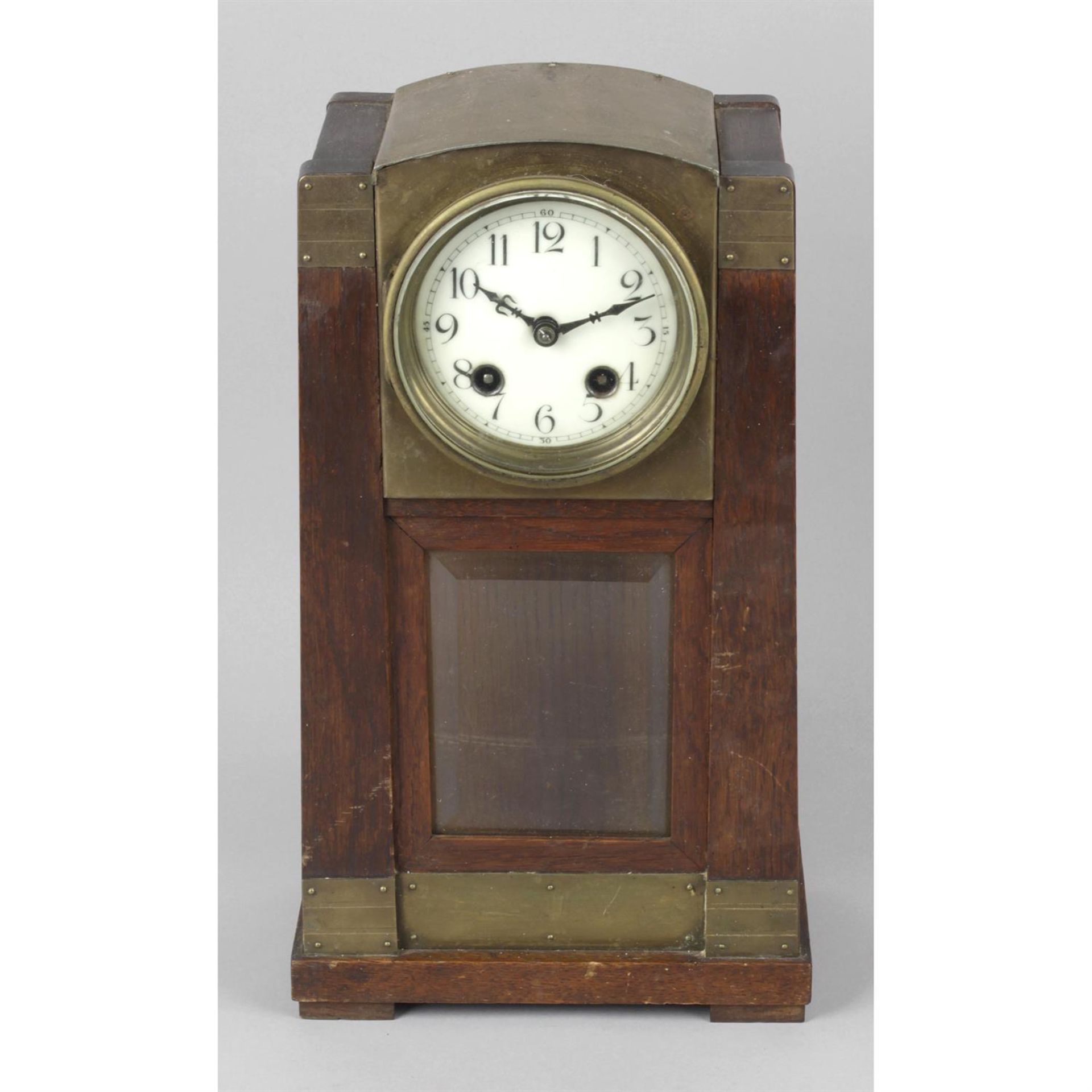 An early 20th century stained wooden and brass mantel clock, together with a reproduction stained