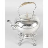 A George II silver tea kettle on stand.