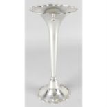 A George V silver trumpet shape vase, together with a smaller octagonal-sided vase (filled base),