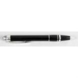 A Montblanc Starwalker propelling rollerball pen.