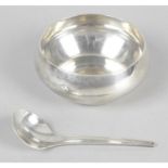 A Georg Jensen silver sugar bowl and spoon, designed by Henning Koppel.