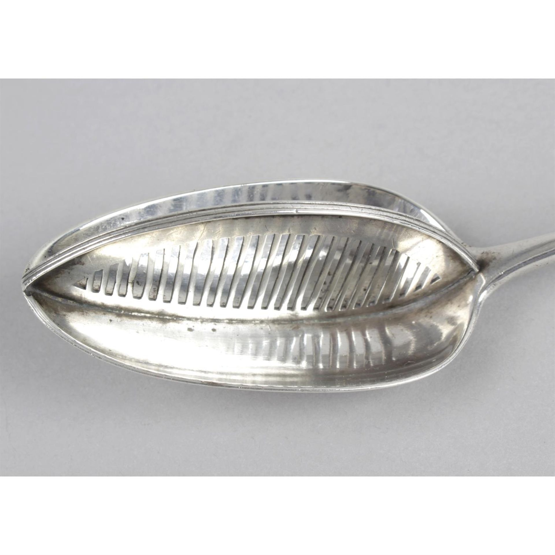 A George III silver straining spoon in Old English pattern. - Image 2 of 3