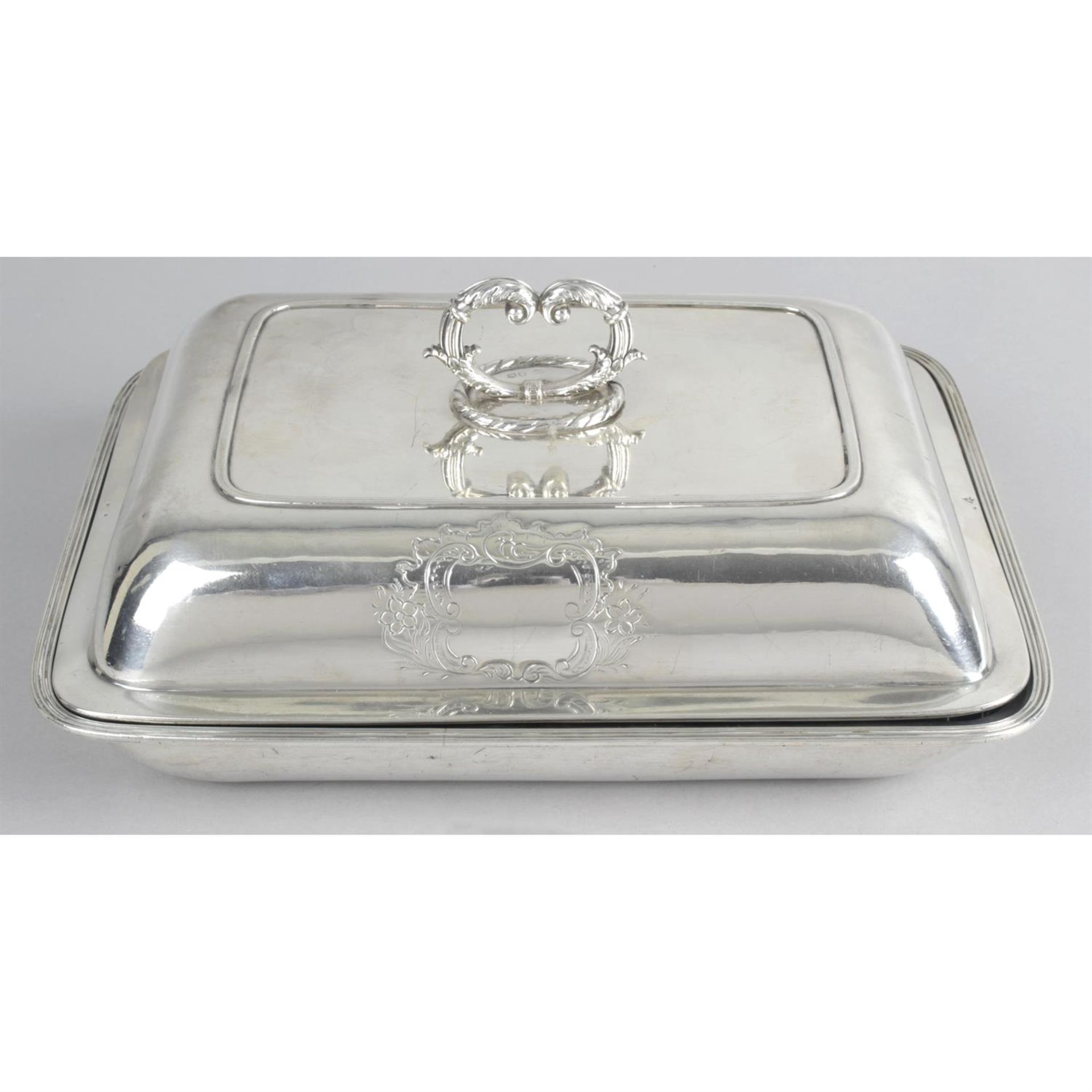 A George III silver entrée dish and cover.