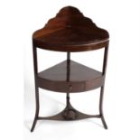 A 19th century mahogany corner washstand.