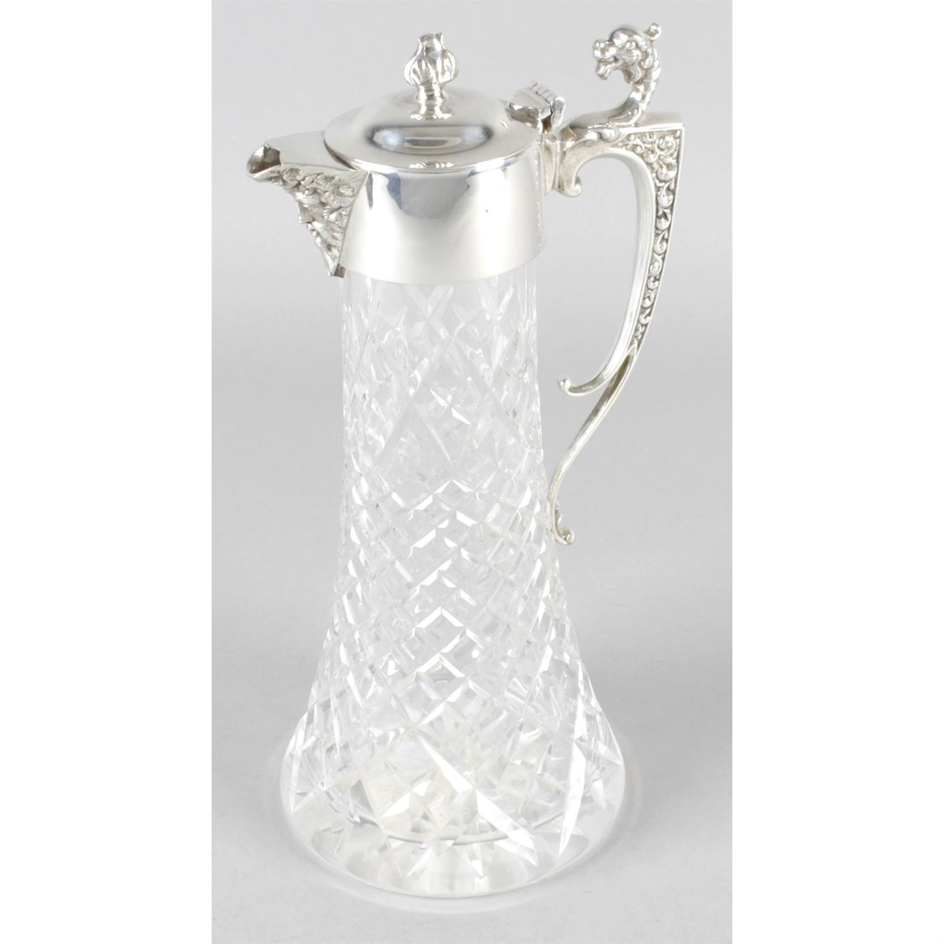 A modern silver mounted and cut glass claret jug.