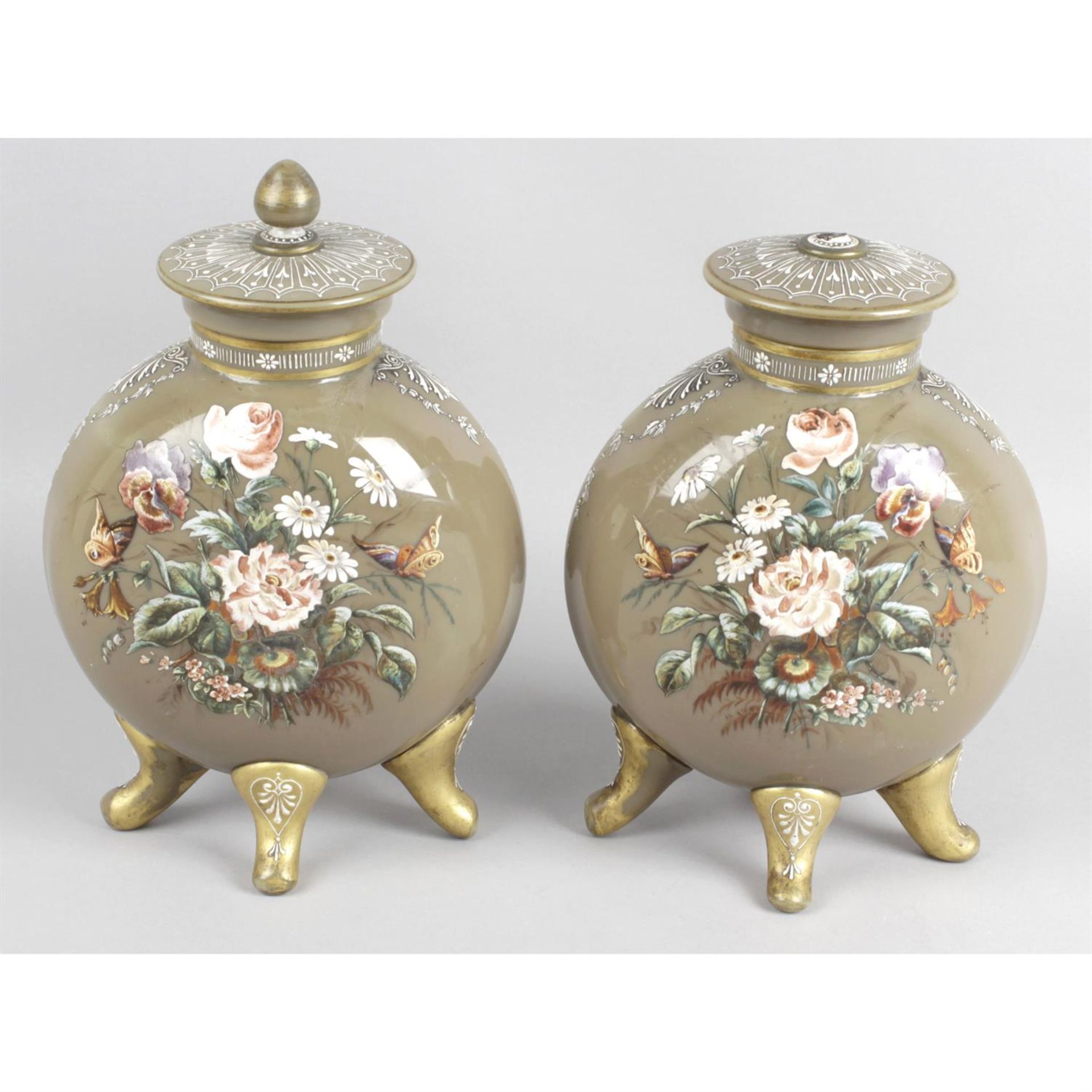 A pair of Victorian blown opaque glass lidded vases.