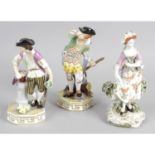 A pair of Royal Crown Derby bone china figurines, together with other figurines.