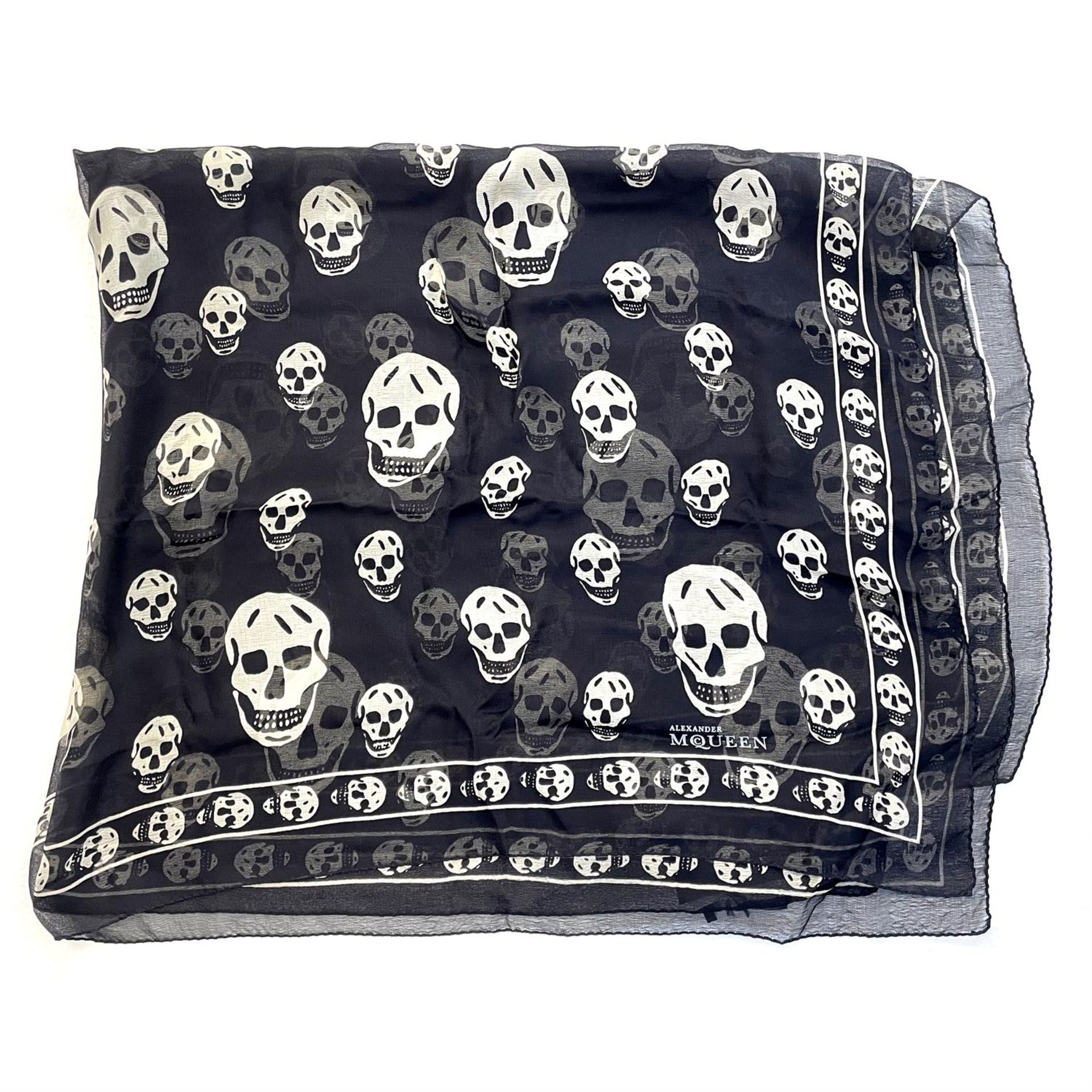 ALEXANDER MCQUEEN - a black chiffon skull scarf.