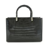 GUCCI - A black bamboo handbag