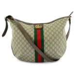 GUCCI- a monogram shoulder bag.