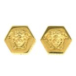 VERSACE - a pair of medusa stud earrings.