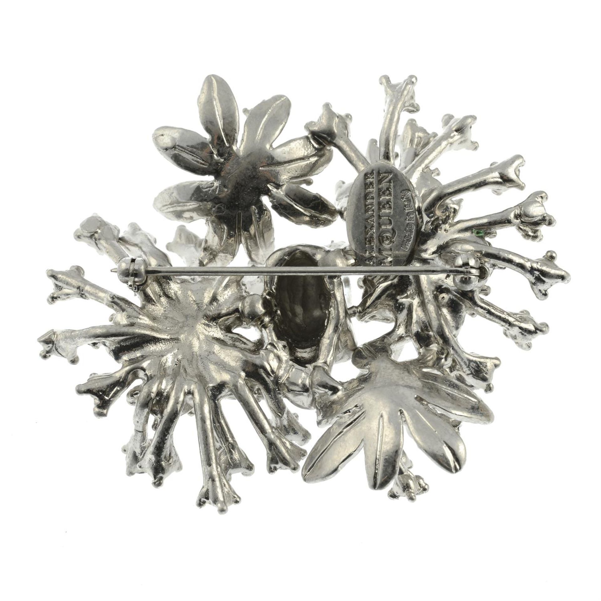 ALEXANDER MCQUEEN - a colourless paste skull and floral spray brooch. - Image 2 of 2