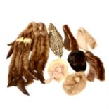 A mink stole and collection of furs.