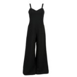 CHANEL - a black jumpsuit.